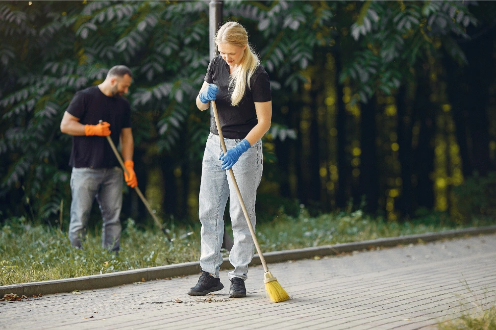 Naples pressure washing Professional Naples pressure washing removing oil stains, tire marks, algae, and dirt from a residential concrete driveway